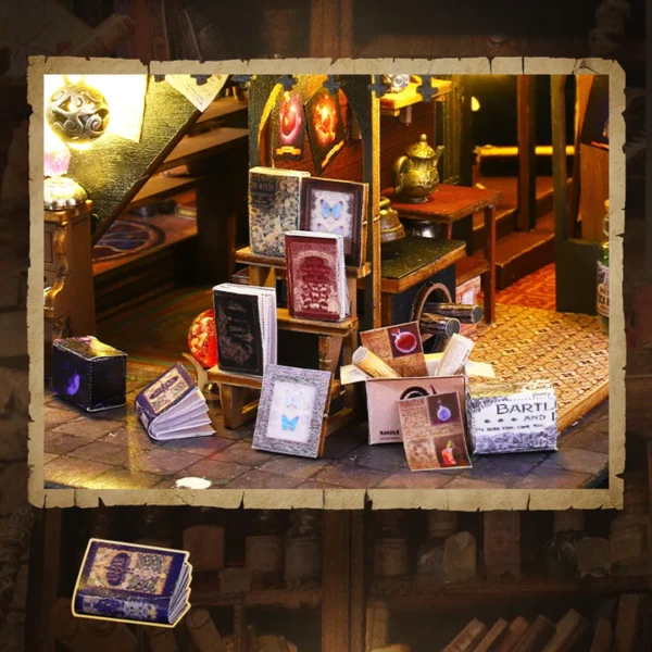 Close-up of miniature magic books and scrolls on display in the Luna Magic House dollhouse, illuminated by LED lights.