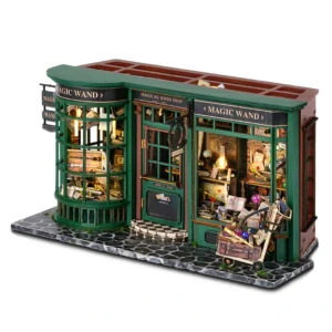 Magic Wand Shop Miniature Dollhouse Kit with a green storefront, detailed interiors, and a charming, whimsical design.