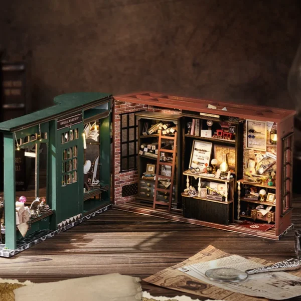 Open interior view of the Magic Wand Shop Miniature Dollhouse Kit, revealing detailed shelves, ladders, and enchanting decor.