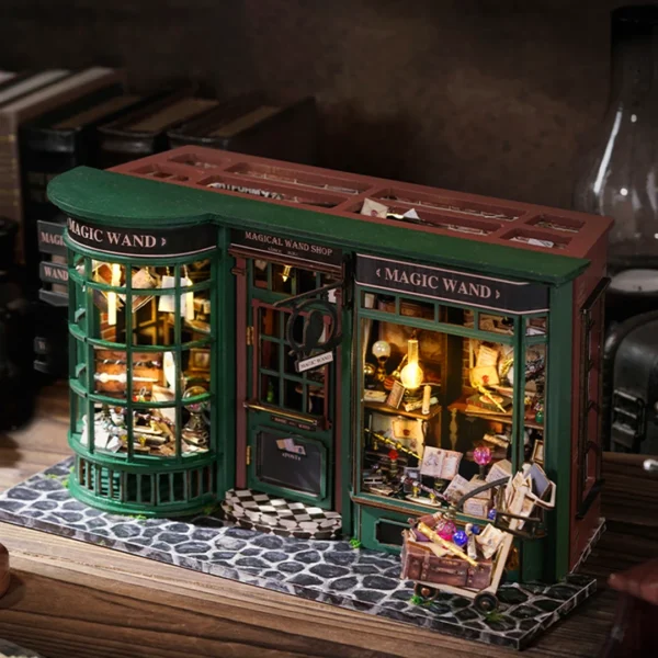 Overhead view of Magic Wand Shop Miniature Dollhouse Kit with detailed interiors and a cozy, enchanting setting.