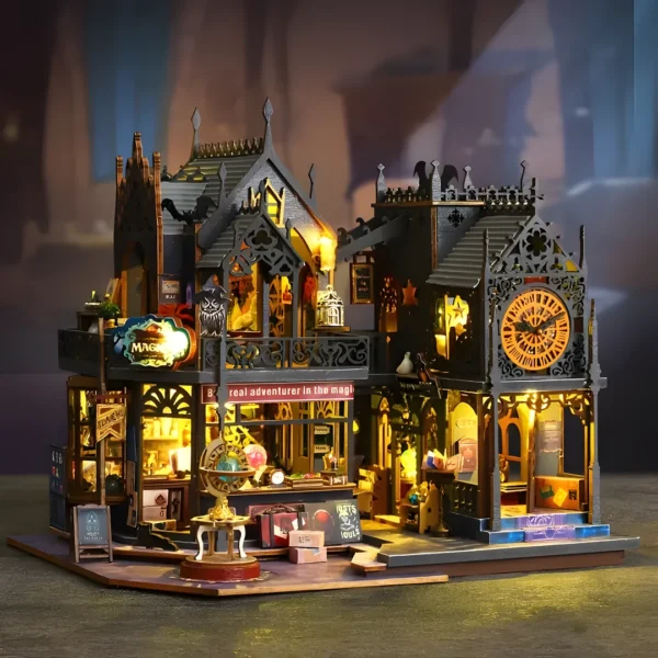 Close-up of the Holo Magic City miniature dollhouse kit featuring a brightly lit magic clock tower and an intricately detailed storefront under a warm, ambient light.