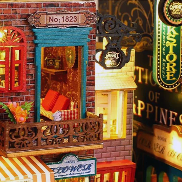 Close-up of the balcony and signboards of the Scarbrough Hotel's flower shop, showcasing intricate details and a nostalgic ambiance in the miniature dollhouse kit.