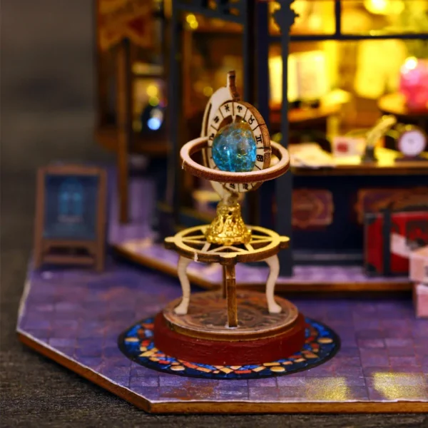 A close-up of a celestial globe with runic symbols and a glowing blue orb, displayed on an ornate stand in a magical setting.