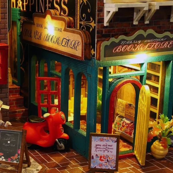 Cozy corner bookstore in Scarbrough Hotel DIY miniature dollhouse kit with vintage decor and a red scooter parked outside, illuminated by warm lights.