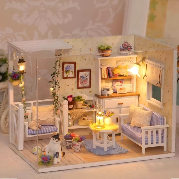 A cozy living room scene from the Kitten Diary miniature dollhouse kit, featuring a softly lit interior with a swing-style chair, a double sofa, a curious kitten, and warm ambient lighting.