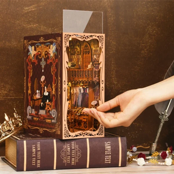 Dust cover of the Gorgeous Wardrobe of Duchess book nook being raised, showing the detailed interior.