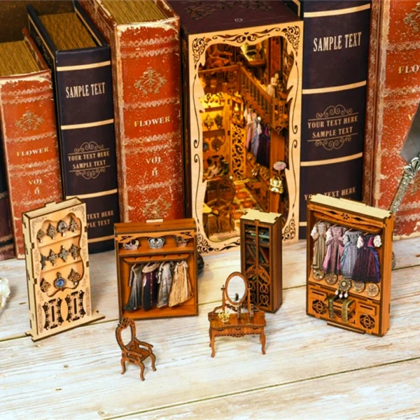 A display of miniature furniture from the Gorgeous Wardrobe of Duchess book nook, including dressers, jewelry cabinets, and wardrobes with detailed aristocratic accessories.