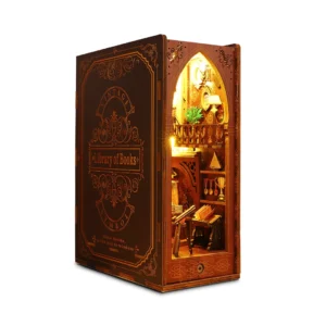 Main image of the Library of Books Book Nook Kit, featuring a two-story miniature library with vintage décor details and warm LED lighting.