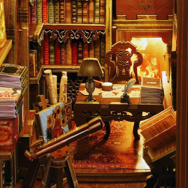 Close-up of the first floor of the Library of Books book nook, featuring a telescope, desk, fireplace, and shelves filled with books.