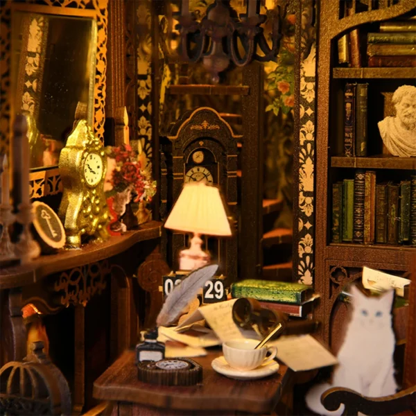 Close-up of the first floor interior of the Magic Time Wonder Library Book Nook, featuring vintage clocks, a writing desk, a lamp, and a white cat.