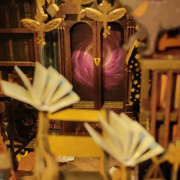 Close-up of a magical portal surrounded by floating books in the Magic Time Wonder Library book nook.