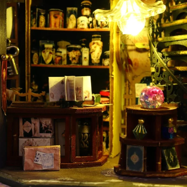 Detailed view of the Holo Magic City DIY miniature dollhouse's interior featuring a crystal ball, spellbook, and shelves of magical artifacts in a warmly lit magic shop.