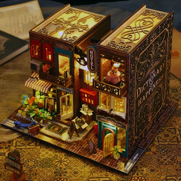 Scarbrough Hotel DIY Miniature Dollhouse Kit displayed on a vintage-style desk with warm lighting and intricate details, evoking a sense of nostalgia and elegance.