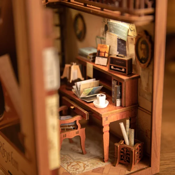 Close-up view of The Secret Rhythm's study desk with vintage radio, open books, and a coffee cup.